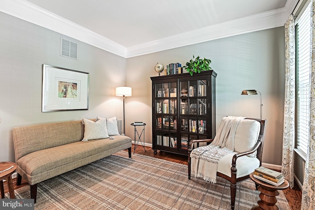 20337 Charter Oak Dr, Ashburn, VA 20147 - sitting room with healthy amount of natural light, crown molding, baseboards, and wood finished floors