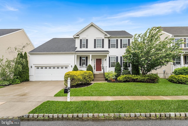 310 Windsor Rd, Mullica Hill, NJ 08062 - view of front of house with a garage, concrete driveway, a front lawn, and a porch