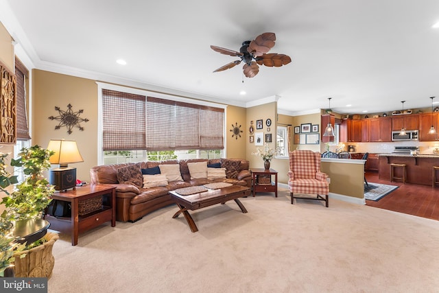 310 Windsor Rd, Mullica Hill, NJ 08062 - living area with crown molding, recessed lighting, ceiling fan, light colored carpet, and baseboards