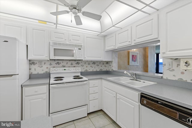 605 Chesapeake House Rd Unit 605N, Bethany Beach, DE 19930 - kitchen featuring white appliances, white cabinets, ceiling fan, a sink, and light countertops