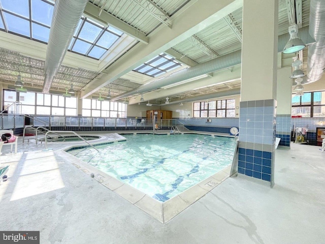 605 Chesapeake House Rd Unit 605N, Bethany Beach, DE 19930 - indoor community pool featuring a skylight