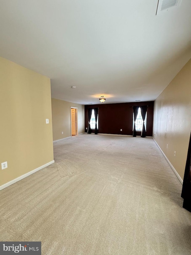1719 Idlewild Blvd, Fredericksburg, VA 22401 - unfurnished living room featuring light carpet and baseboards