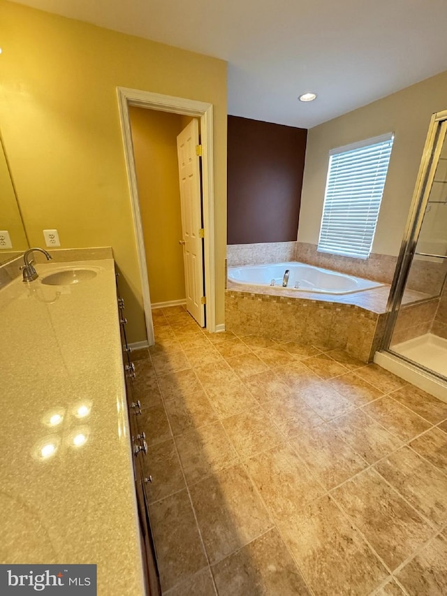 1719 Idlewild Blvd, Fredericksburg, VA 22401 - full bath with a garden tub, a stall shower, vanity, and tile patterned flooring