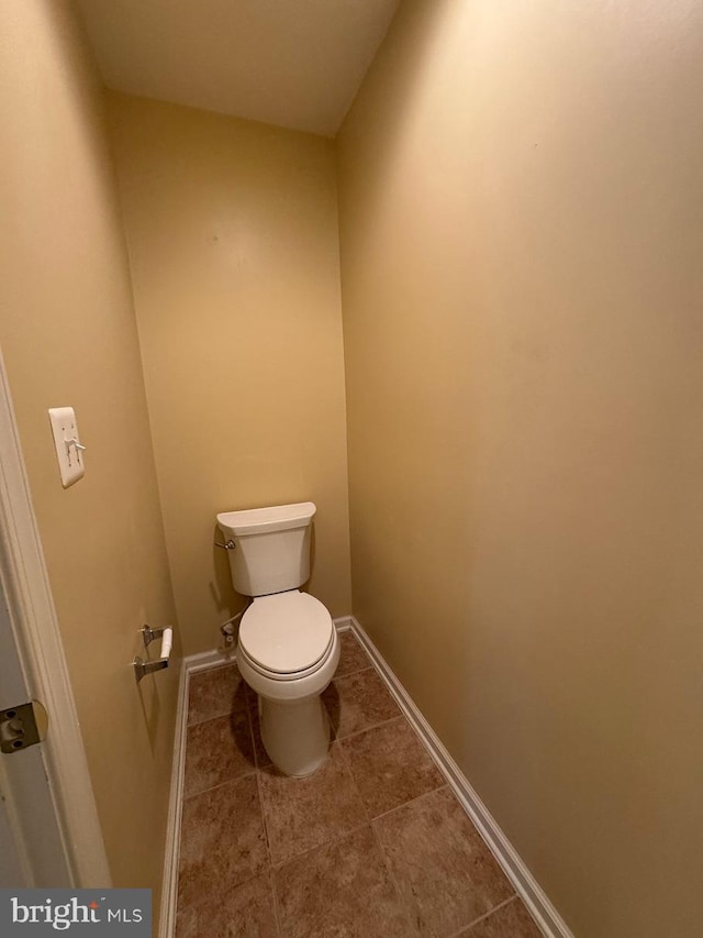 1719 Idlewild Blvd, Fredericksburg, VA 22401 - bathroom with toilet, baseboards, and tile patterned flooring