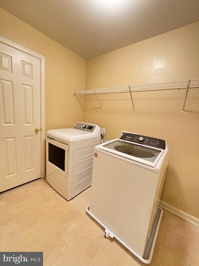 1719 Idlewild Blvd, Fredericksburg, VA 22401 - washroom featuring independent washer and dryer and baseboards