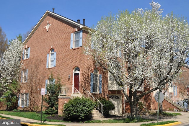 4714 Major Ct, Alexandria, VA 22312 - view of property with brick siding and an attached garage