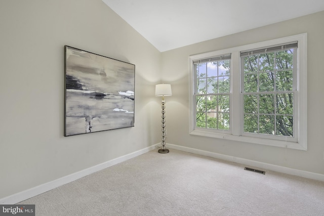 4714 Major Ct, Alexandria, VA 22312 - carpeted empty room featuring plenty of natural light, baseboards, and vaulted ceiling