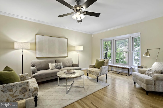 4714 Major Ct, Alexandria, VA 22312 - living area featuring ornamental molding, light wood-style floors, a ceiling fan, and baseboards