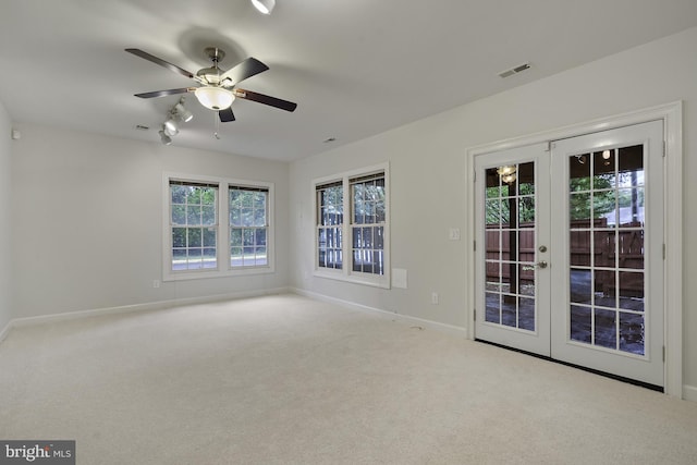 4714 Major Ct, Alexandria, VA 22312 - carpeted empty room with plenty of natural light, baseboards, a ceiling fan, and french doors