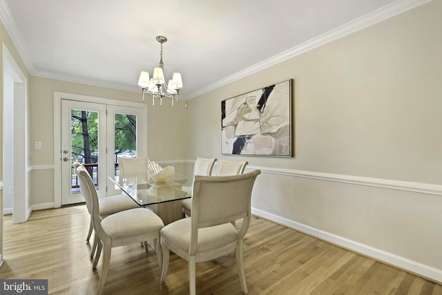 4714 Major Ct, Alexandria, VA 22312 - dining space with a chandelier, light wood-style flooring, ornamental molding, baseboards, and french doors