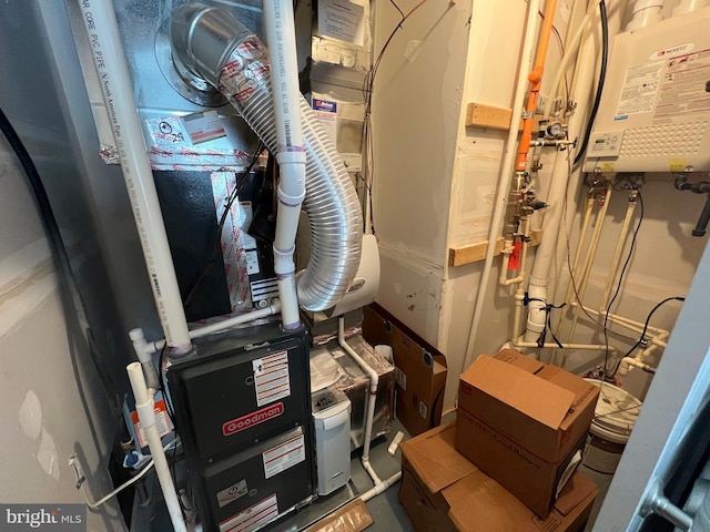 utility room with tankless water heater