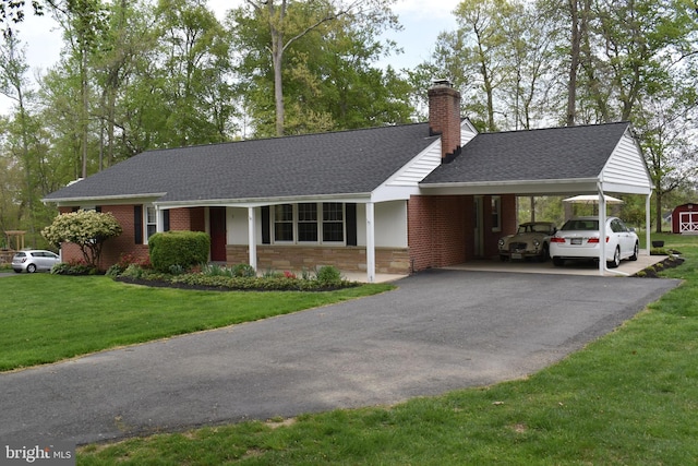7 Tudor Ln, Bel Air, MD 21015 - single story home with a chimney, a front lawn, stone siding, driveway, and a shingled roof