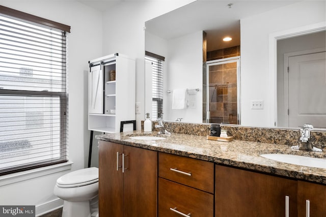 5711 45th Ave, Hyattsville, MD 20781 - full bathroom featuring toilet, double vanity, and a shower stall