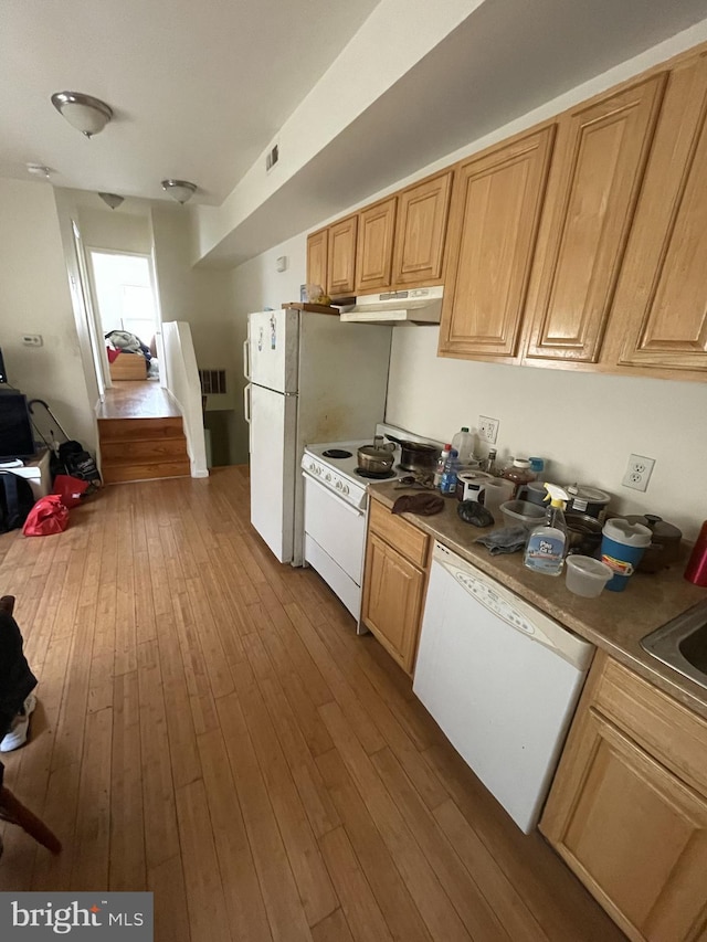 1844 W Master St, Philadelphia, PA 19121 - kitchen with white appliances, under cabinet range hood, and dark wood-style flooring
