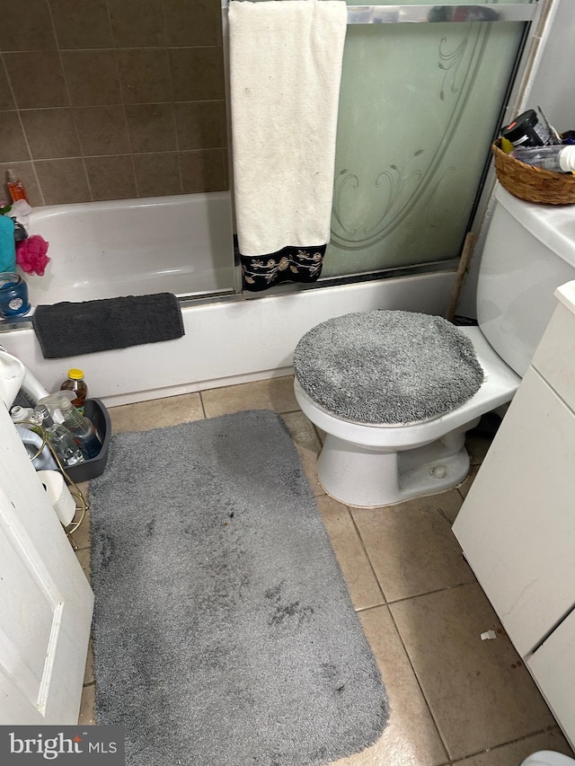 1844 W Master St, Philadelphia, PA 19121 - bathroom featuring tile patterned flooring, toilet, and enclosed tub / shower combo