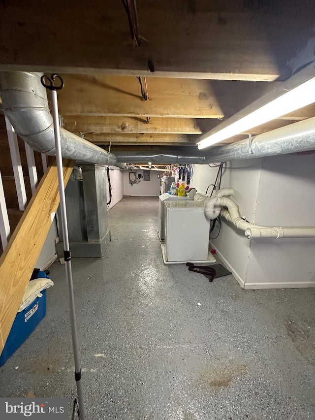 1844 W Master St, Philadelphia, PA 19121 - unfinished below grade area featuring baseboards and washing machine and clothes dryer