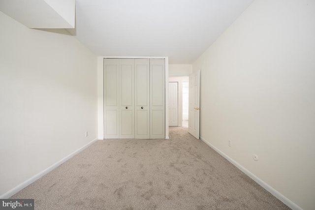262 Drummers Ln Unit 262, Wayne, PA 19087 - unfurnished bedroom featuring carpet floors, baseboards, and a closet