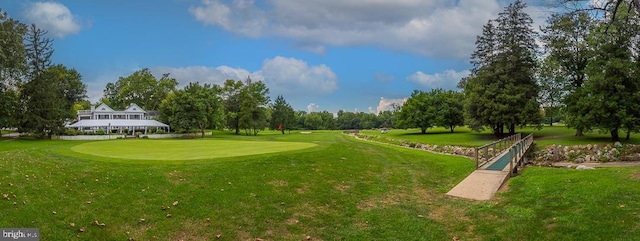 262 Drummers Ln Unit 262, Wayne, PA 19087 - view of property's community with a yard, view of wooded area, and golf course view