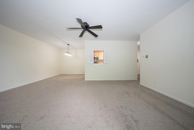 262 Drummers Ln Unit 262, Wayne, PA 19087 - unfurnished living room featuring a ceiling fan, carpet flooring, and baseboards