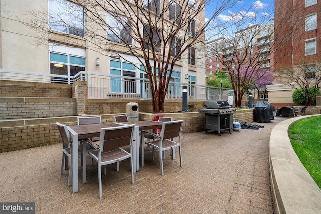 3830 9th St N Unit 110W, Arlington, VA 22203 - view of patio / terrace featuring grilling area and outdoor dining space