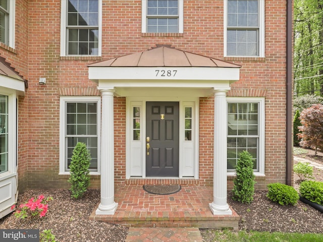 7287 Evans Mill Rd, Mclean, VA 22101 - view of exterior entry with brick siding