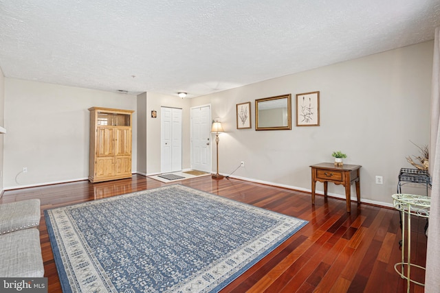 8357 Cypress Mill Rd Unit 8357, Nottingham, MD 21236 - entryway with baseboards, wood finished floors, and a textured ceiling