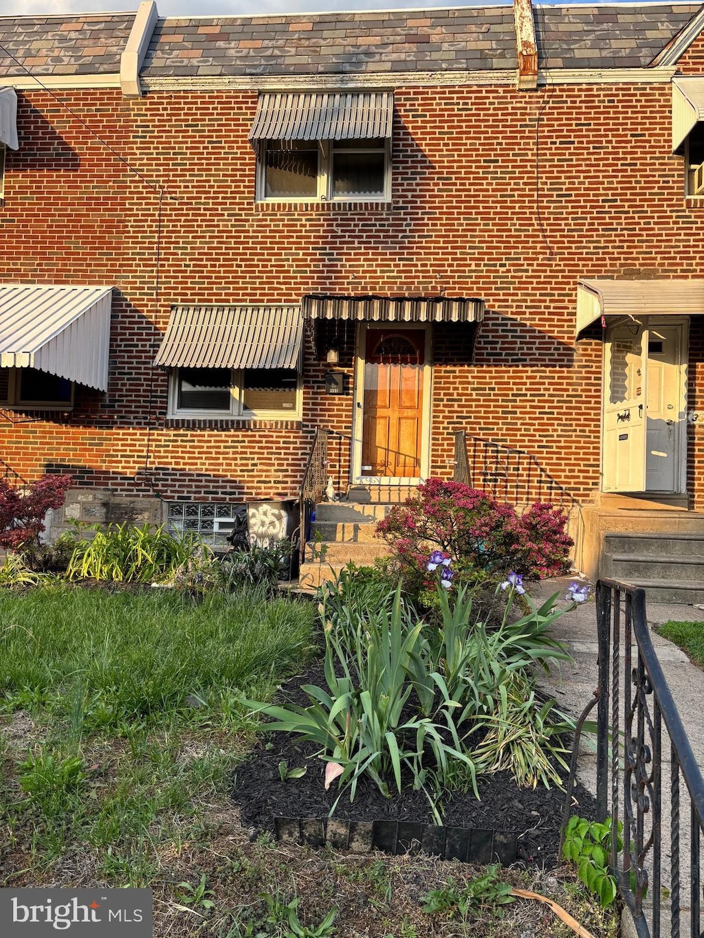 3551 Rhawn St, Philadelphia, PA 19136 - view of front of home with brick siding and a high end roof