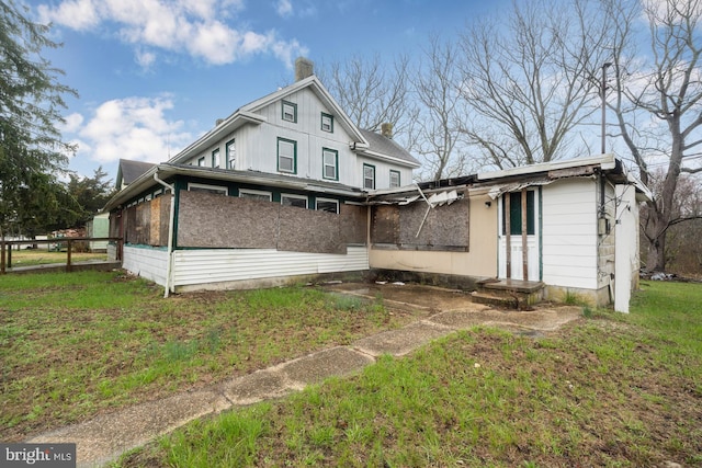 615 S New York Rd, Absecon, NJ 08205 - rear view of house featuring a chimney