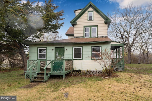 615 S New York Rd, Absecon, NJ 08205 - view of front facade with a front lawn and roof with shingles