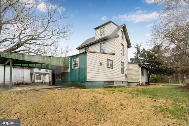 615 S New York Rd, Absecon, NJ 08205 - view of side of property featuring a lawn
