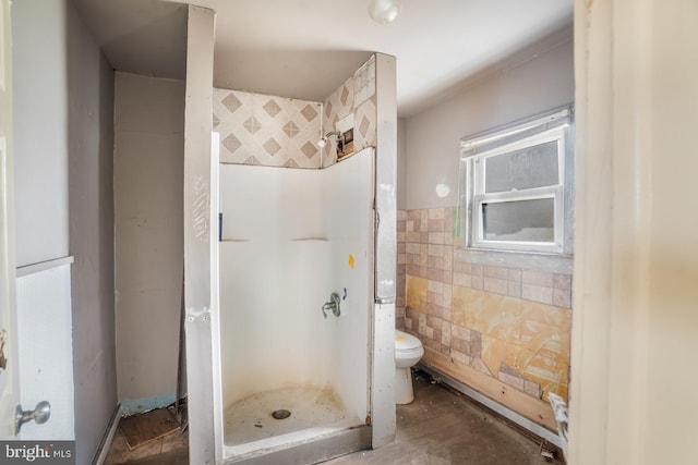 615 S New York Rd, Absecon, NJ 08205 - full bath featuring a stall shower, toilet, and tile walls