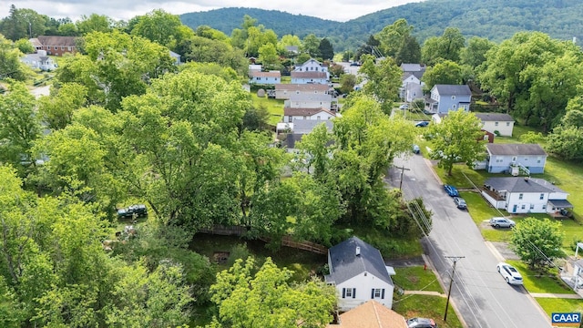 aerial perspective of suburban area with a mountain backdrop