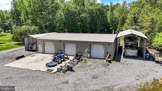 17397 Rosiers Creek Ln, King George, VA 22485 - garage featuring a garage and gravel driveway