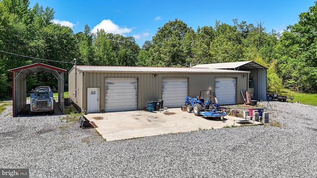 17397 Rosiers Creek Ln, King George, VA 22485 - detached garage featuring a carport and gravel driveway