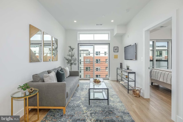 2310 4th St NE Unit 22, Washington, DC 20002 - living area featuring light wood-type flooring, recessed lighting, and baseboards