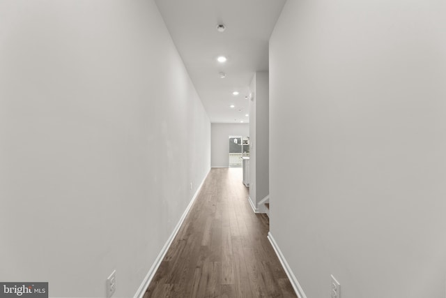 40 Marion Ave, Bordentown, NJ 08505 - corridor with recessed lighting, dark wood-type flooring, an upstairs landing, and baseboards