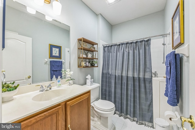 full bathroom featuring tile patterned flooring, toilet, curtained shower, and vanity