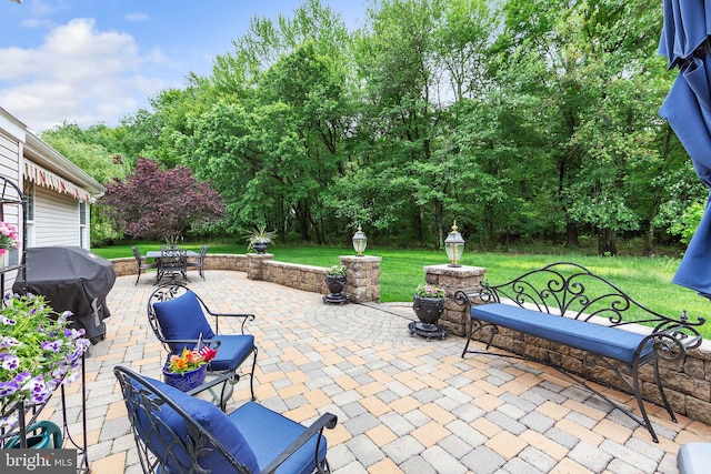 view of patio / terrace with a grill and outdoor dining area