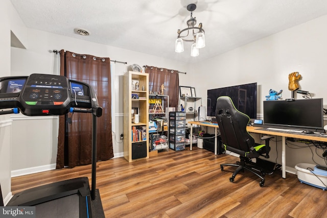 11500 Acton Ln, Waldorf, MD 20601 - office space with wood finished floors and a chandelier