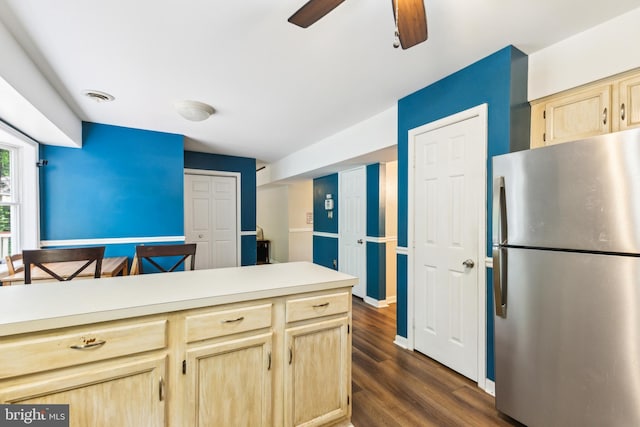 11500 Acton Ln, Waldorf, MD 20601 - kitchen with freestanding refrigerator, light brown cabinets, dark wood-style flooring, light countertops, and ceiling fan