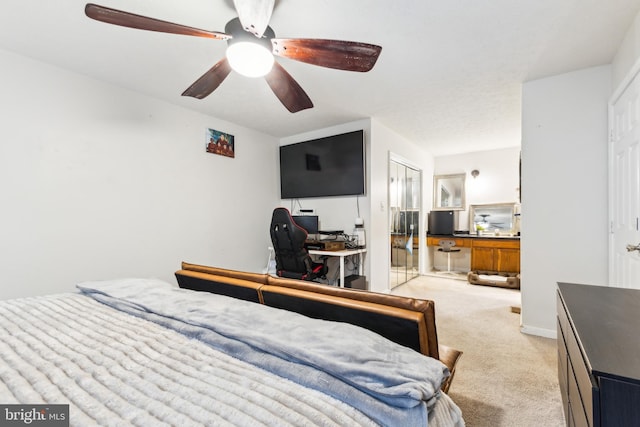 11500 Acton Ln, Waldorf, MD 20601 - bedroom with a desk, light carpet, ceiling fan, and ensuite bathroom