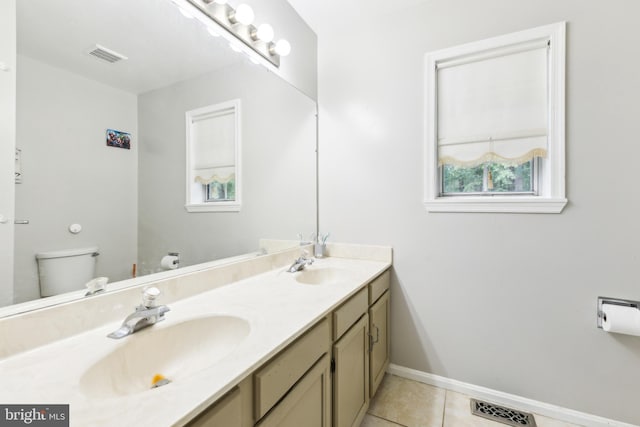 11500 Acton Ln, Waldorf, MD 20601 - bathroom featuring double vanity and tile patterned floors