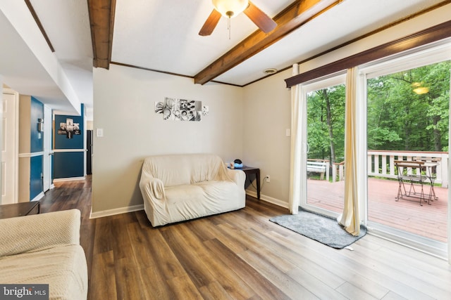 11500 Acton Ln, Waldorf, MD 20601 - living room featuring beam ceiling, wood finished floors, and a ceiling fan