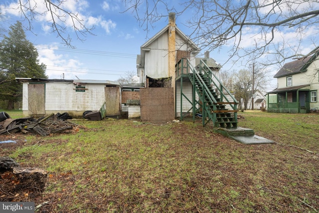 611-615 S New York Rd, Absecon, NJ 08205 - view of green lawn with stairs and an outdoor structure