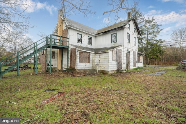 611-615 S New York Rd, Absecon, NJ 08205 - rear view of house featuring stairway, a chimney, and a deck