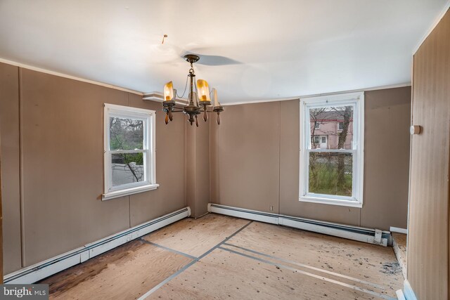 611-615 S New York Rd, Absecon, NJ 08205 - unfurnished room with a baseboard radiator, healthy amount of natural light, and a chandelier