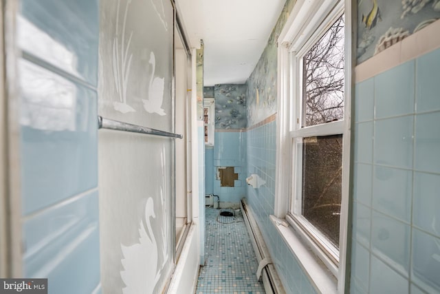 611-615 S New York Rd, Absecon, NJ 08205 - bathroom featuring tile walls, tile patterned floors, and baseboard heating