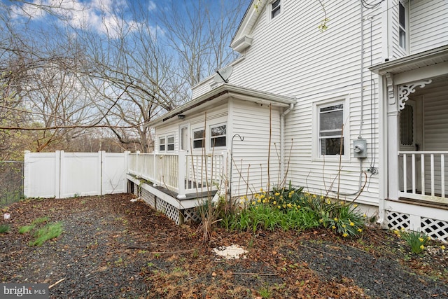 611-615 S New York Rd, Absecon, NJ 08205 - view of side of home featuring a deck and fence