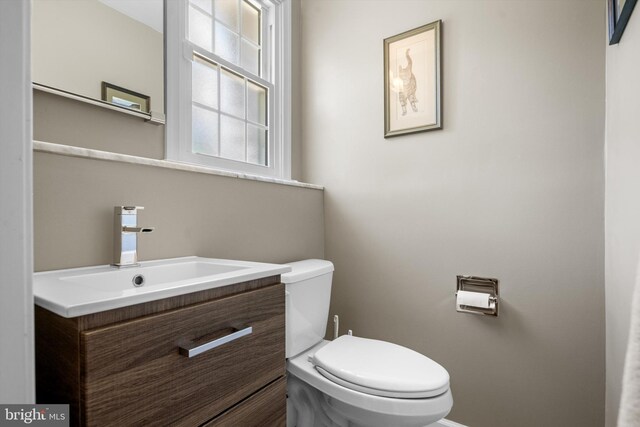 10 Hickory Dr, Doylestown, PA 18901 - bathroom with toilet, vanity, and baseboards