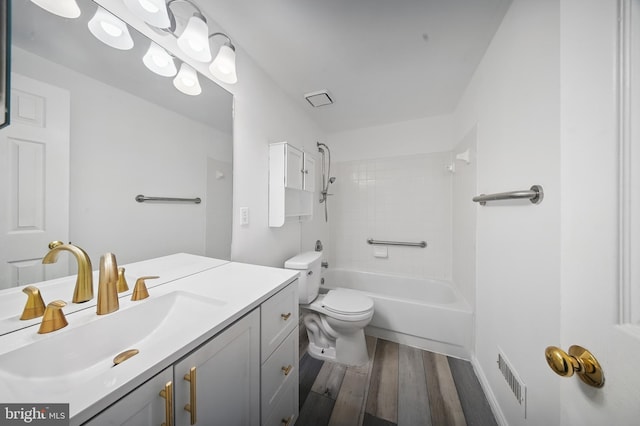 201 Anchor Cv, Stafford, VA 22554 - bathroom featuring wood finished floors, vanity, toilet, and shower / bathtub combination